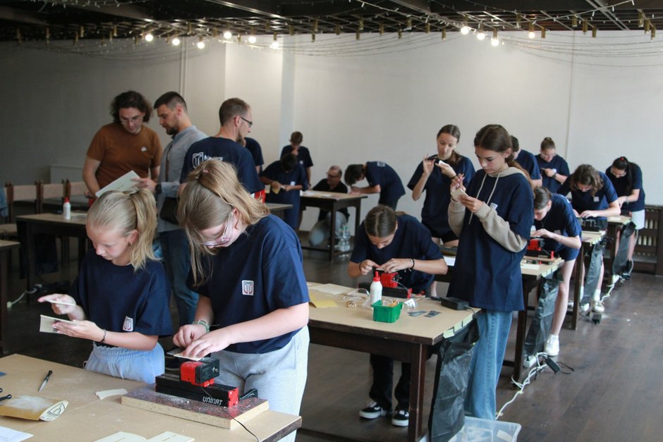 students in an erasmus project working with unimat machines