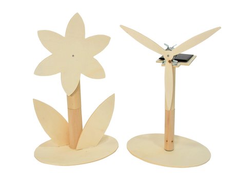 wooden wind milll with a solar panel