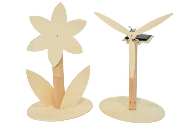 wind mill out of wood with solar panel