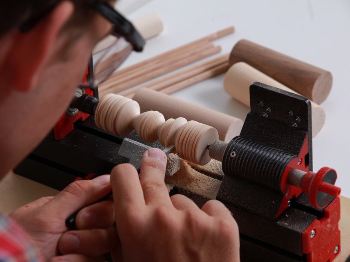 unimat wood lathe in use