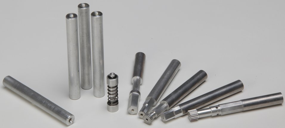 Aluminium rounds with models on a table